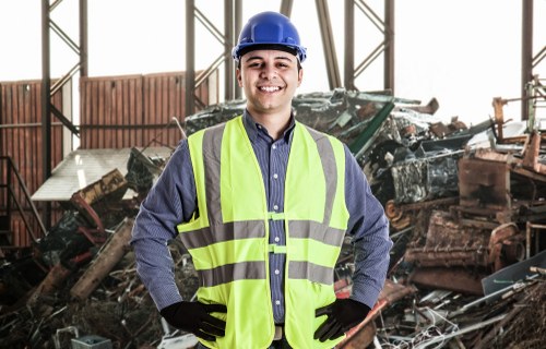 Workers sorting demolition waste in accordance with Richmond regulations